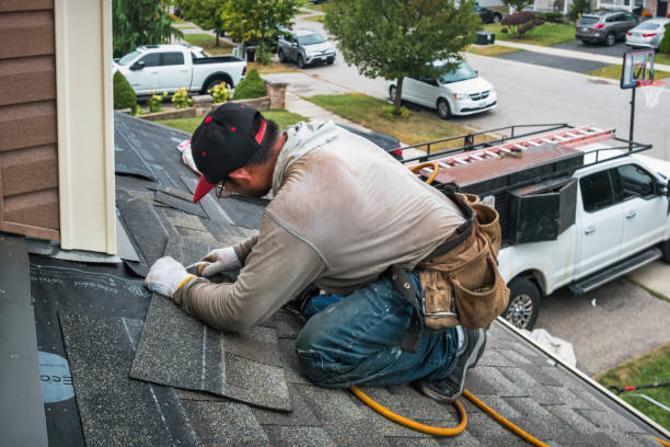 Professional Roof Replacement technician working in Beccaria, PA